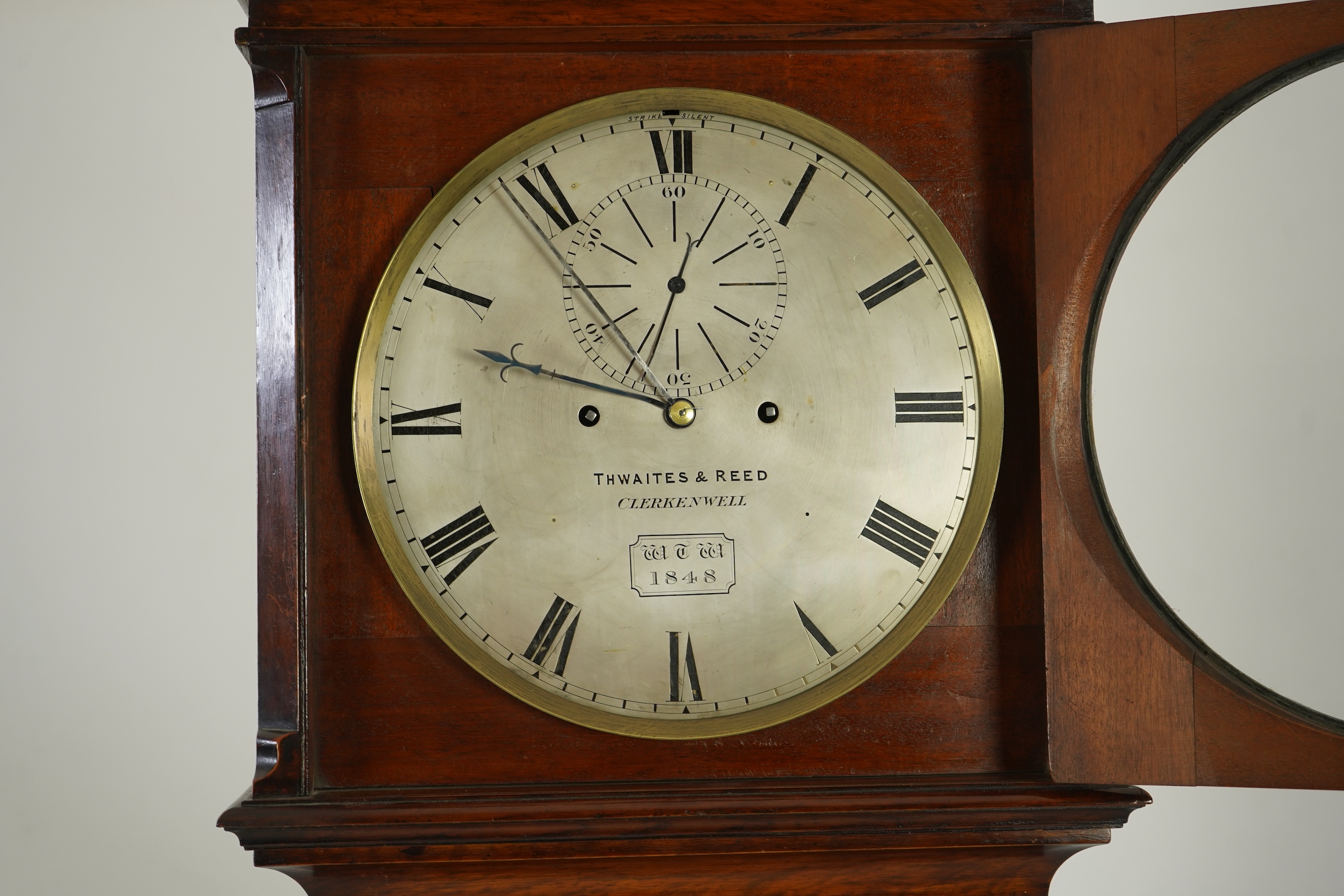 A mid 19th century oak eight day longcase regulator, circular silvered dial signed Thwaites & Reed, Clerkenwell, WTW 1848